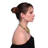 Woman wearing green pearl bead necklace from Pearl Bead Earring and Necklace Set Statement Jewellery.
