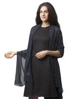 Woman in black dress and blue jacket wearing Pearl-Embellished Chiffon Shawl