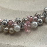 Pink and white pearl cluster bib necklace with bracelet.