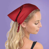 Woman wearing a red cotton bandana with bow.