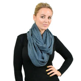 Woman wearing blue pleated ribbed snood scarf