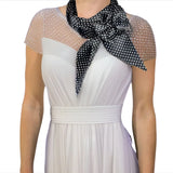 Polka dot satin sash scarf and hair pin set worn by woman in white dress