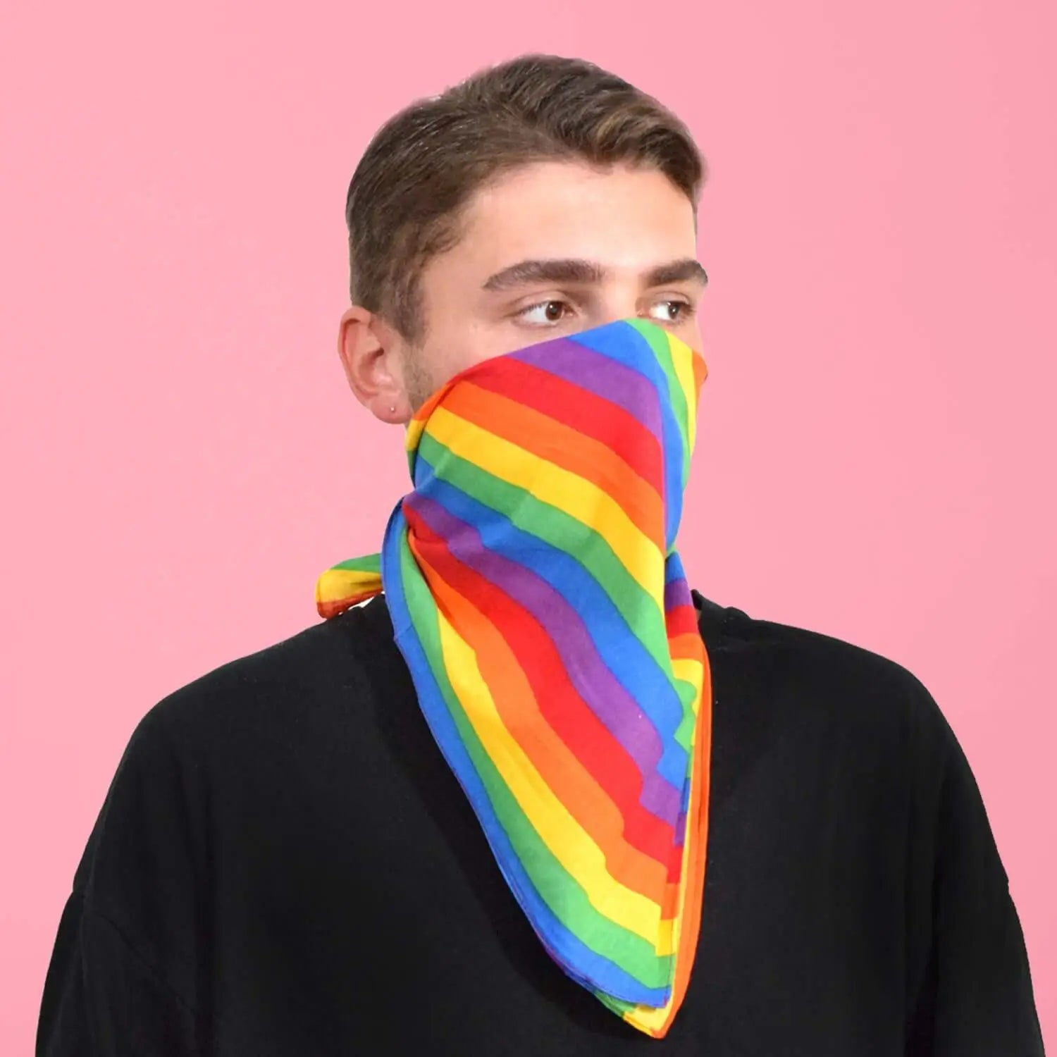 Man wearing rainbow print bandana.