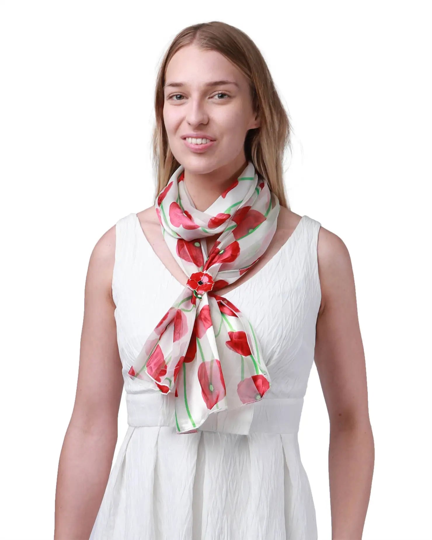 Woman in white dress wearing red and green poppy floral print scarf