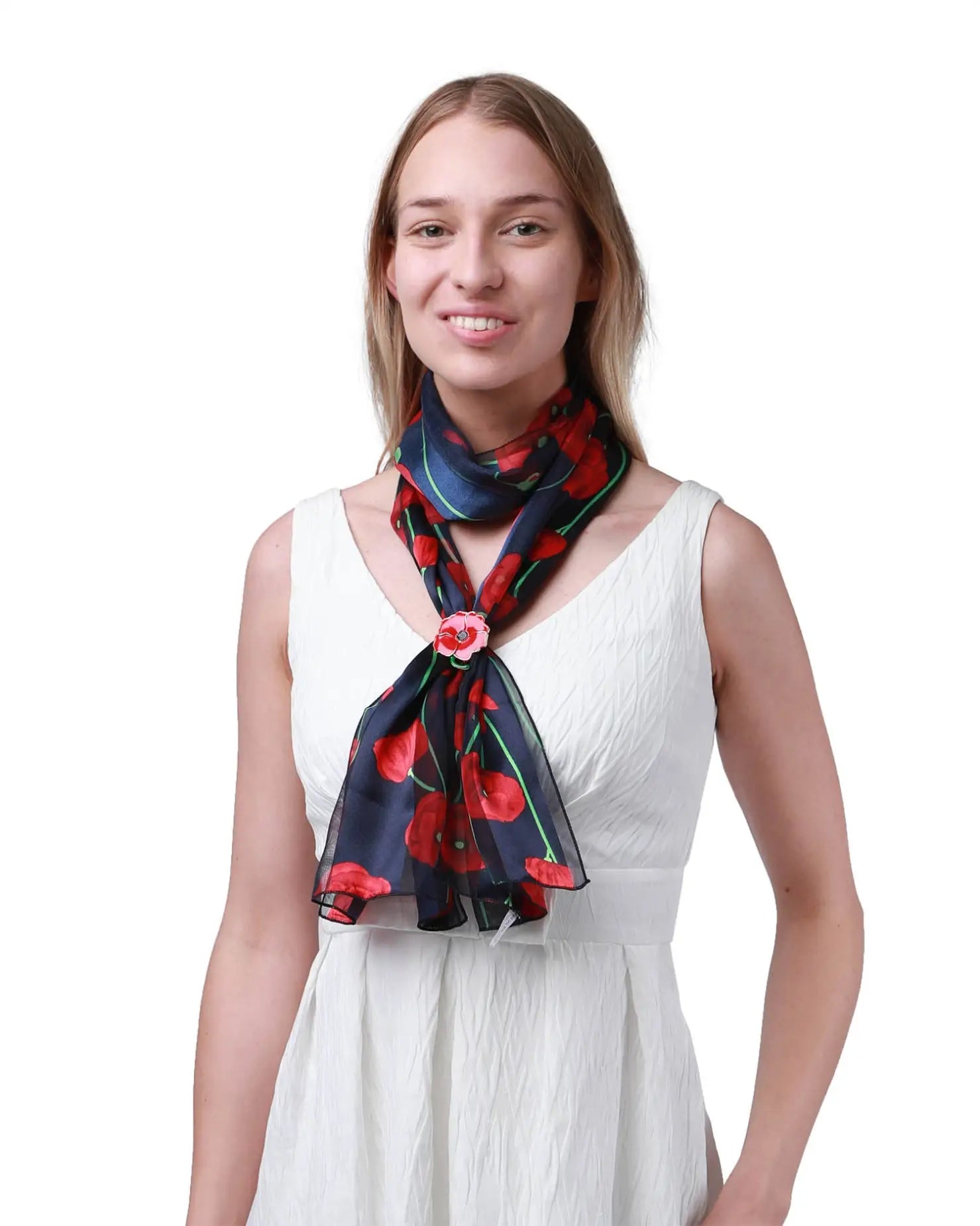 Woman in white dress wearing Remembrance Day Poppy Floral Print Scarf with Gold-Plated Scarf Ring