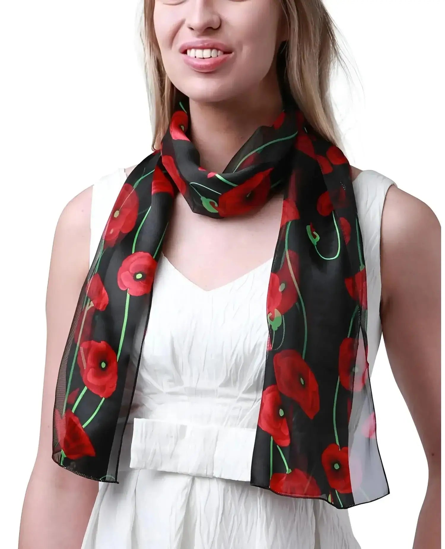 Woman wearing a black and red poppy floral print scarf.
