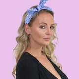 Retro heart print denim headband with bow worn by woman