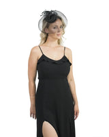 Woman wearing a black hat and dress with Rose Mesh & Feather Net Fascinator