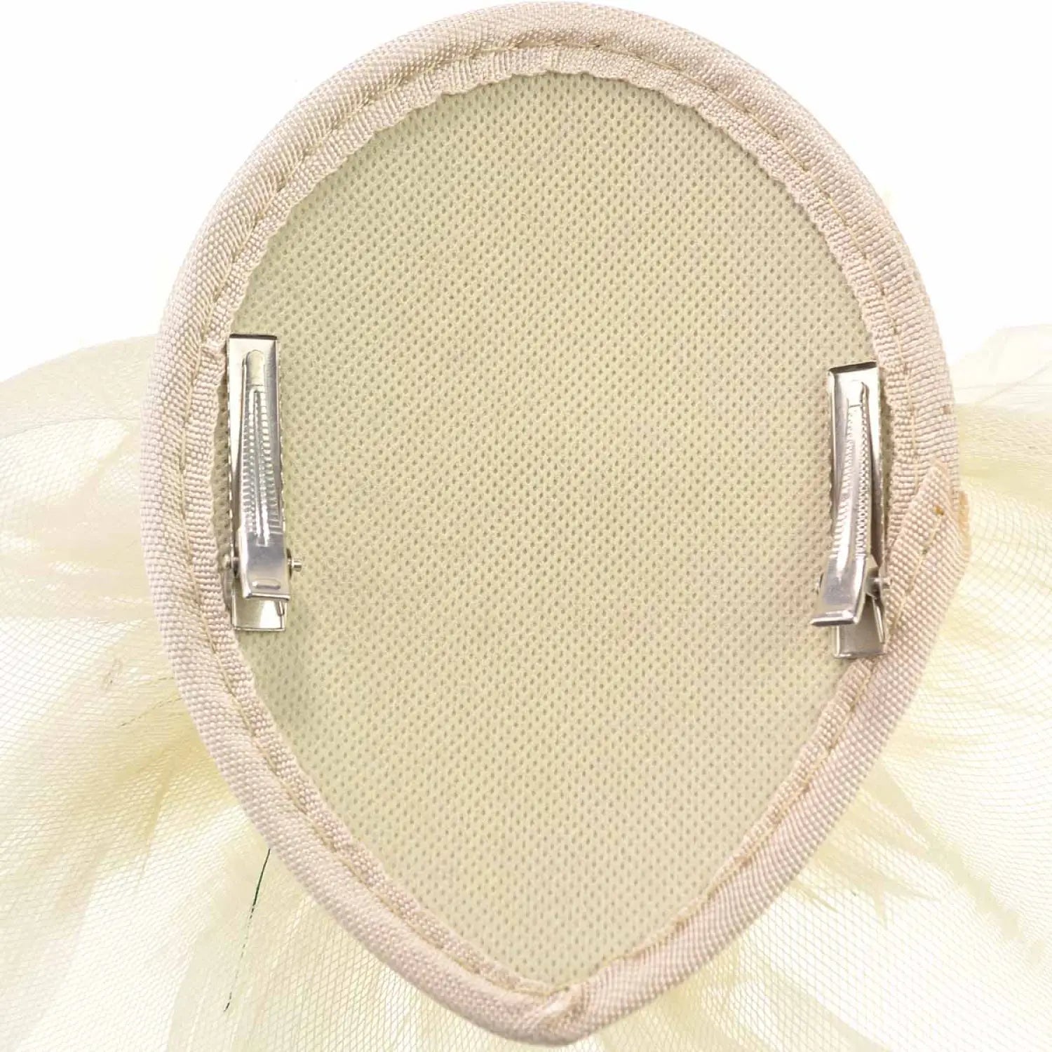White tutu with silver buckle accessory for glamorous evenings.