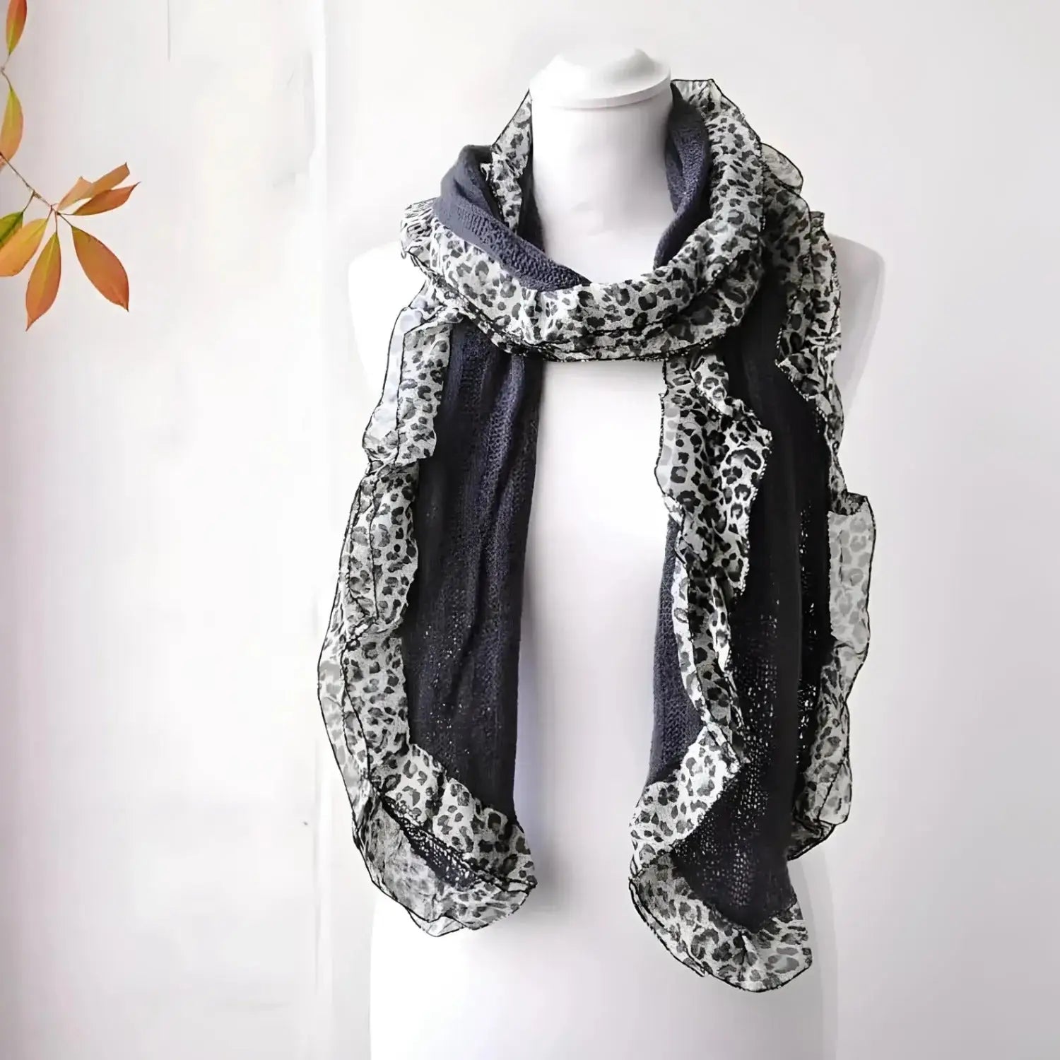 Ruffle leopard print knitted scarf in black and white leopard design