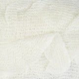 White knitted ruffled scarf on white background - lightweight & stylish