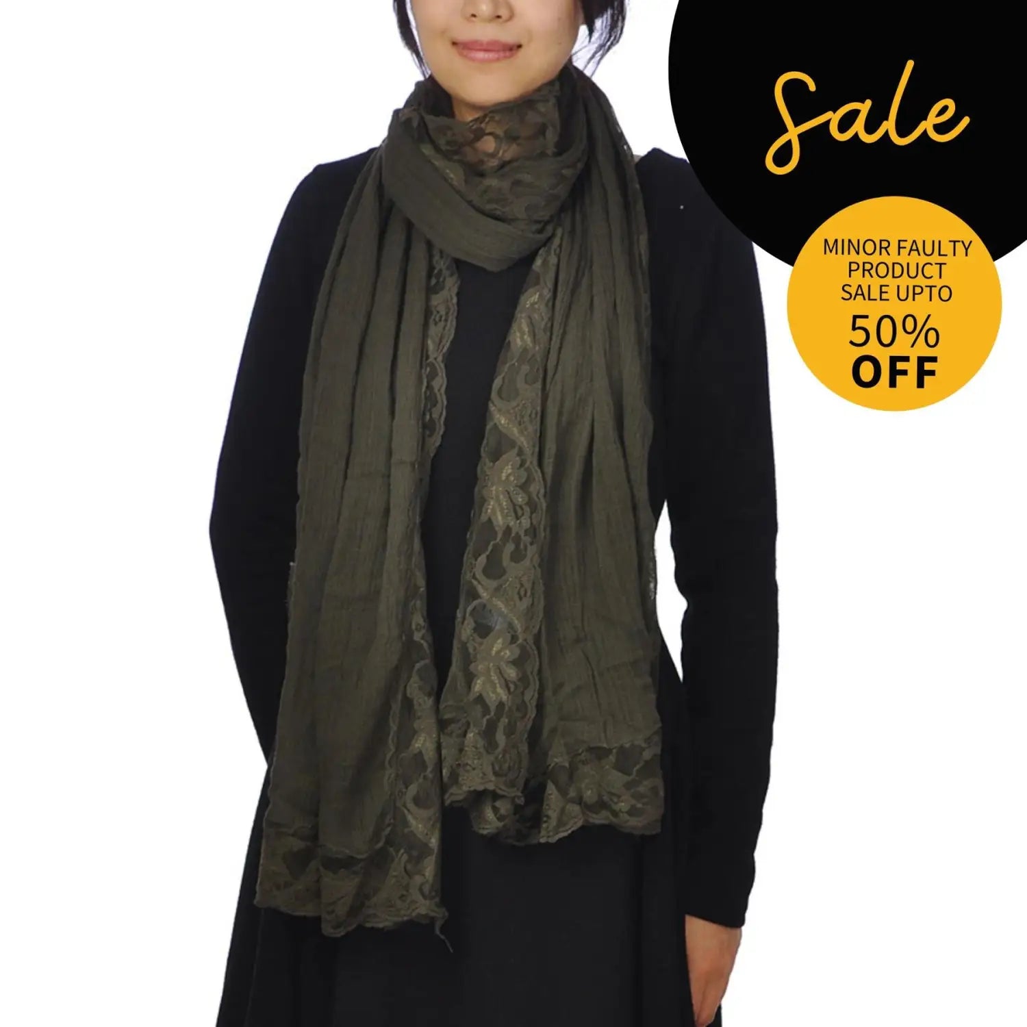 Woman wearing cotton crinkled lace-edged evening scarf in khaki on black background