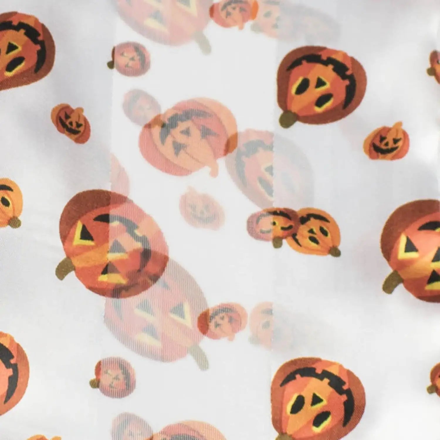 Jack-o’-lantern pumpkins with carved faces on SALE Halloween Scarf featuring minor faults