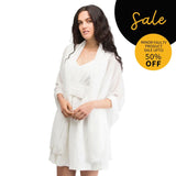 Woman in pearl embellished chiffon robe with black circle background