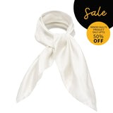 White mulberry silk square scarf with black circle design.