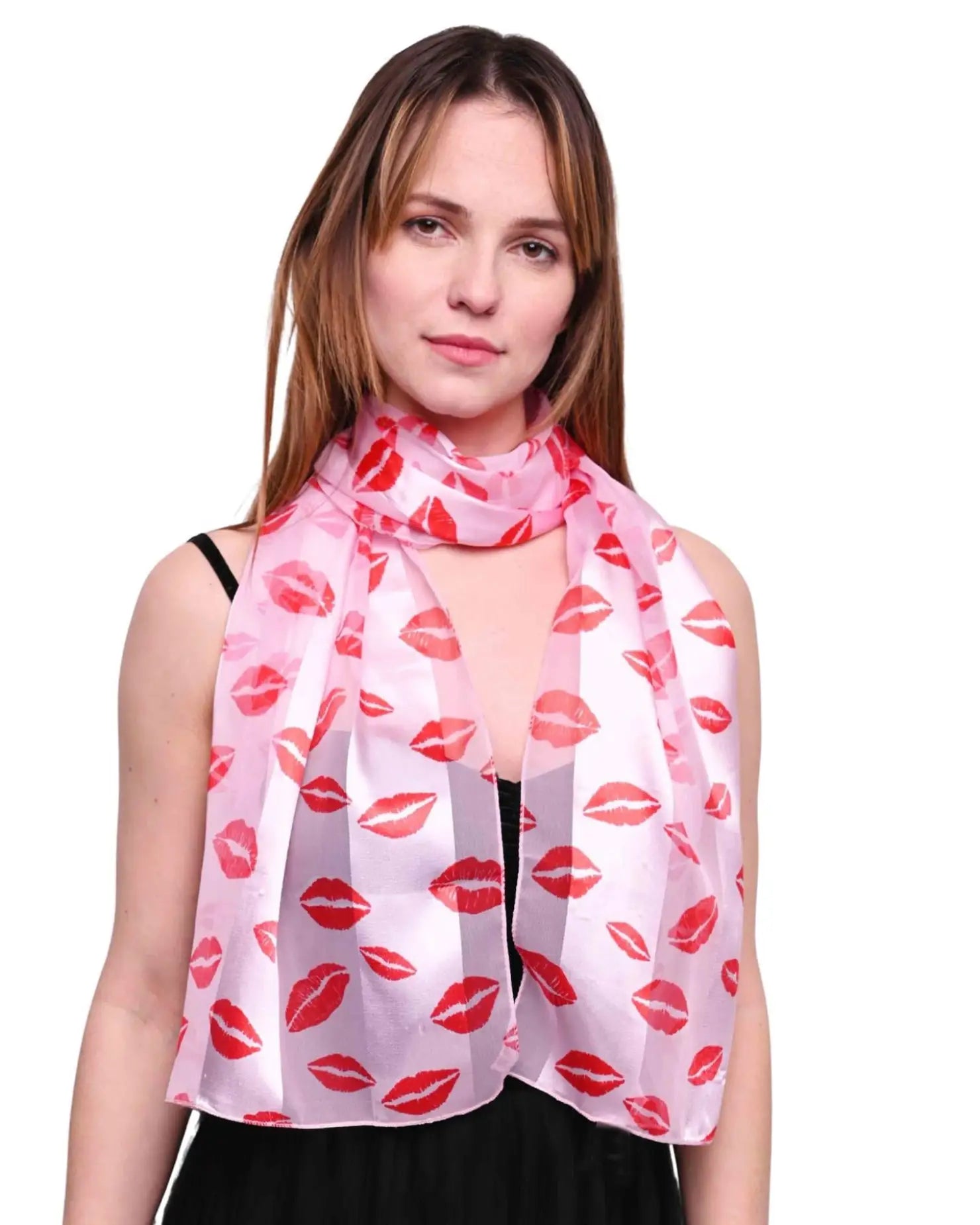 Woman wearing SALE satin lightweight scarf with kiss mark design in pink