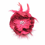 Red satin layered flower clip brooch with feather and crystal highlights