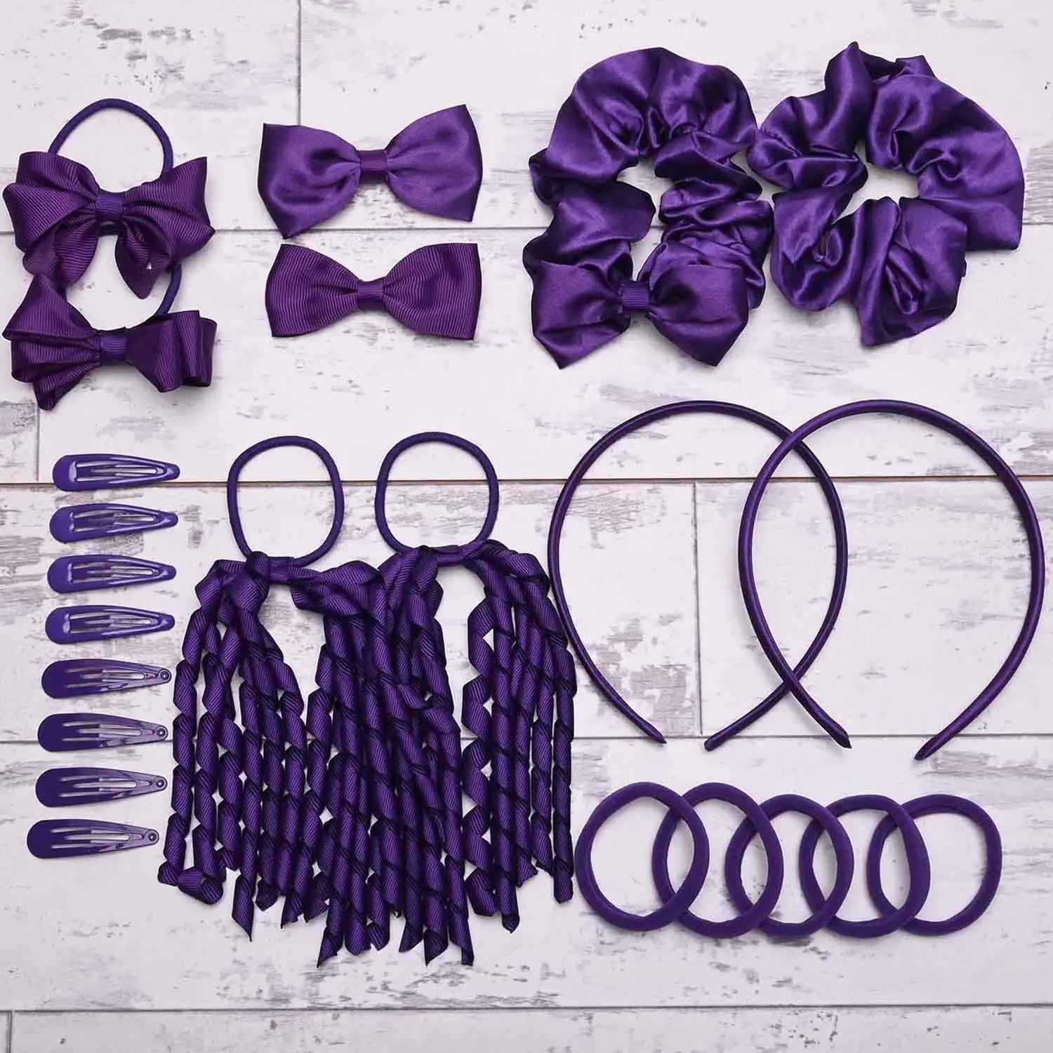 Purple hair accessories from School Girl Plain Hair Accessories Set offering a secure hold