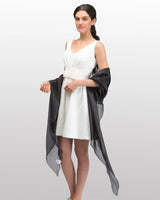 Woman in white dress and black shawl, Sheer Shimmer Evening Lightweight Stole
