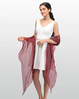 Woman wearing white dress and red shawl from Sheer Shimmer Evening Lightweight Stole product.