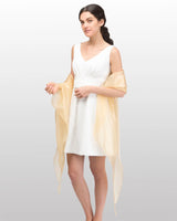 Woman in white dress and yellow shawl: Sheer Shimmer Evening Lightweight Stole.