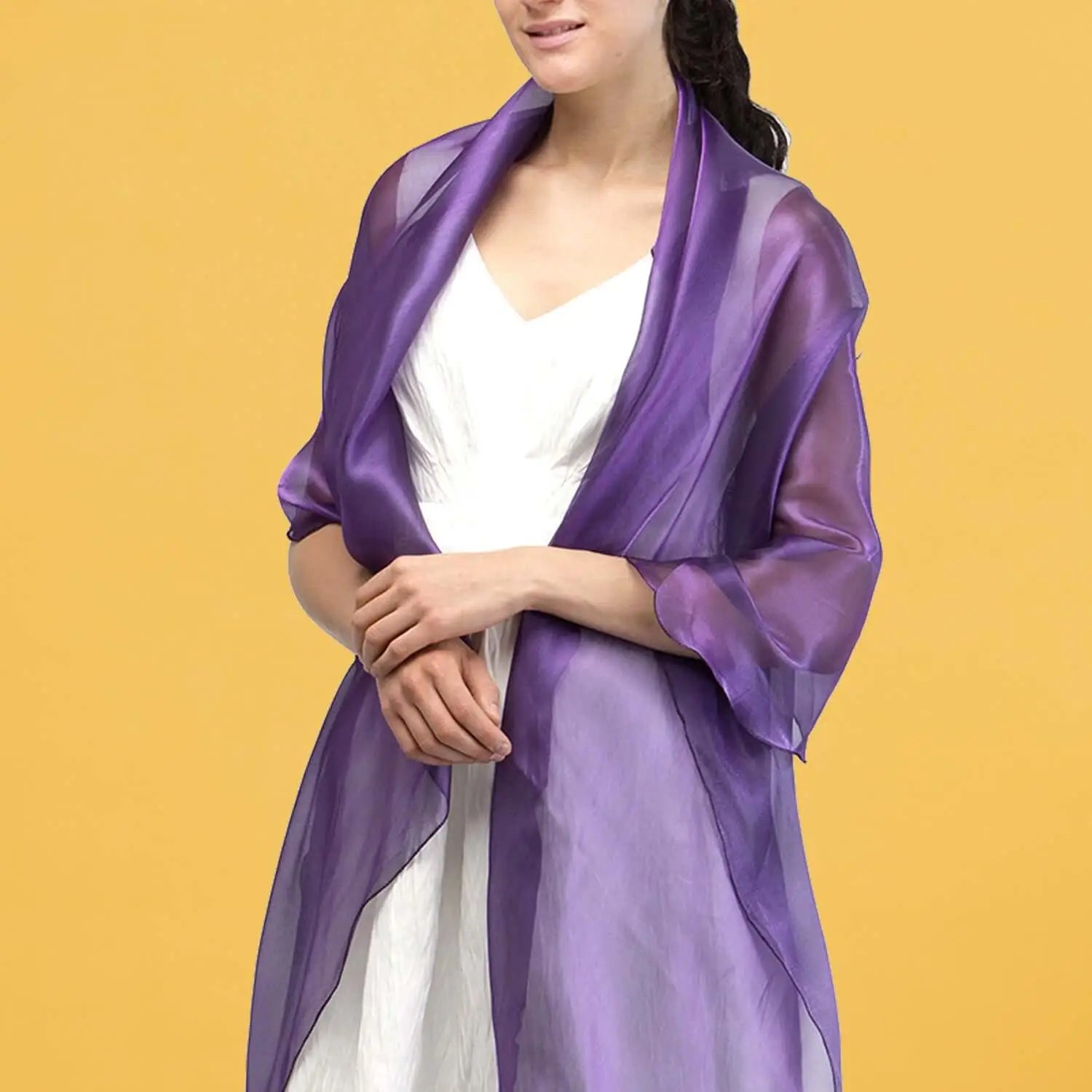 Woman wearing purple shawl from Sheer Shimmer Evening Lightweight Stole collection