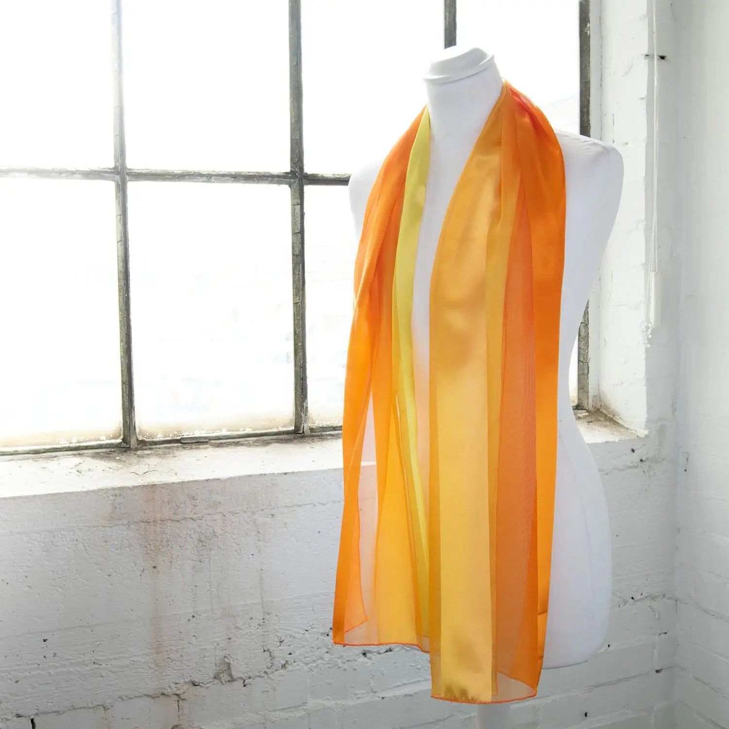 Two-tone satin stripe scarf on mannequin, Shimmer Stripe Satin Scarf.