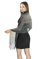 Woman in black and silver lurex fringe sweater, Shimmering Lurex Fishnet Evening Shawl.