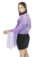 Woman wearing a shimmering lurex fishnet evening shawl with purple fringes