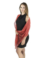 Woman wearing red shawl from Shimmering Lurex Fishnet Evening Shawl Scarves.