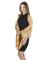 Woman wearing gold lurex shawl from Shimmering Lurex Fishnet Evening Shawl Scarves.