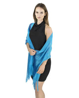 Woman wearing a shimmering lurex fishnet evening scarf