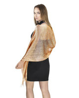 Woman wearing gold lurex fishnet scarf from Shimmering Lurex Scarf Fishnet Evening Shawl Scarves.
