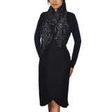 Woman in black dress & scarf with shimmering metallic textured ruffled scarf