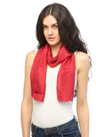 Woman wearing red pure silk scarf.