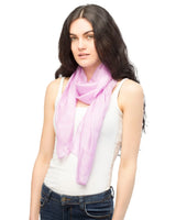 Pure silk lightweight scarf in pink being worn by woman