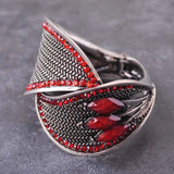 Red stone ring with woven pattern - statement beads on silver bangle bracelet