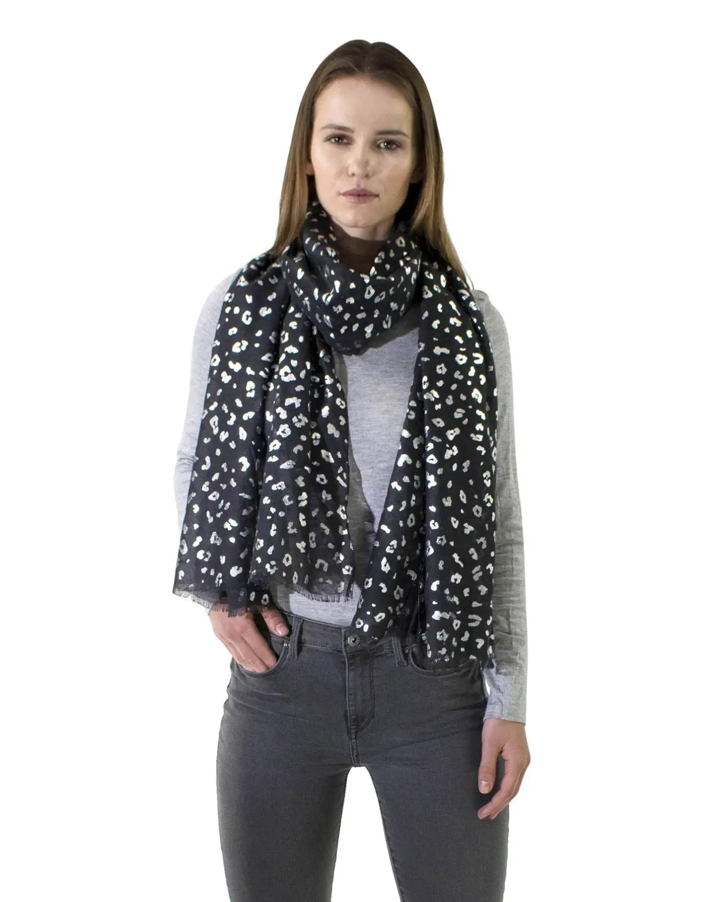 Stylish woman accessorizing with Silver Foil Leopard Print Large Scarf