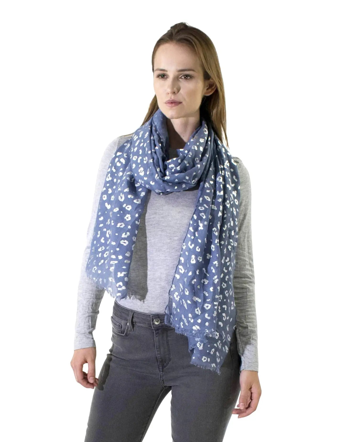 woman wearing silver foil leopard print scarf