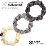 Two mulberry silk hair scrunchies - white and yellow - in Small Skinny Mulberry Silk Hair Scrunchies 3-Pack.