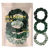 Close up of Small Skinny Mulberry Silk Hair Scrunchies - 3 Pack with silk and hair ties.