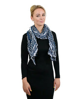 Soft Knitted Scarf with Ruffled Texture & Striped Print - Woman wearing blue and white scarf.