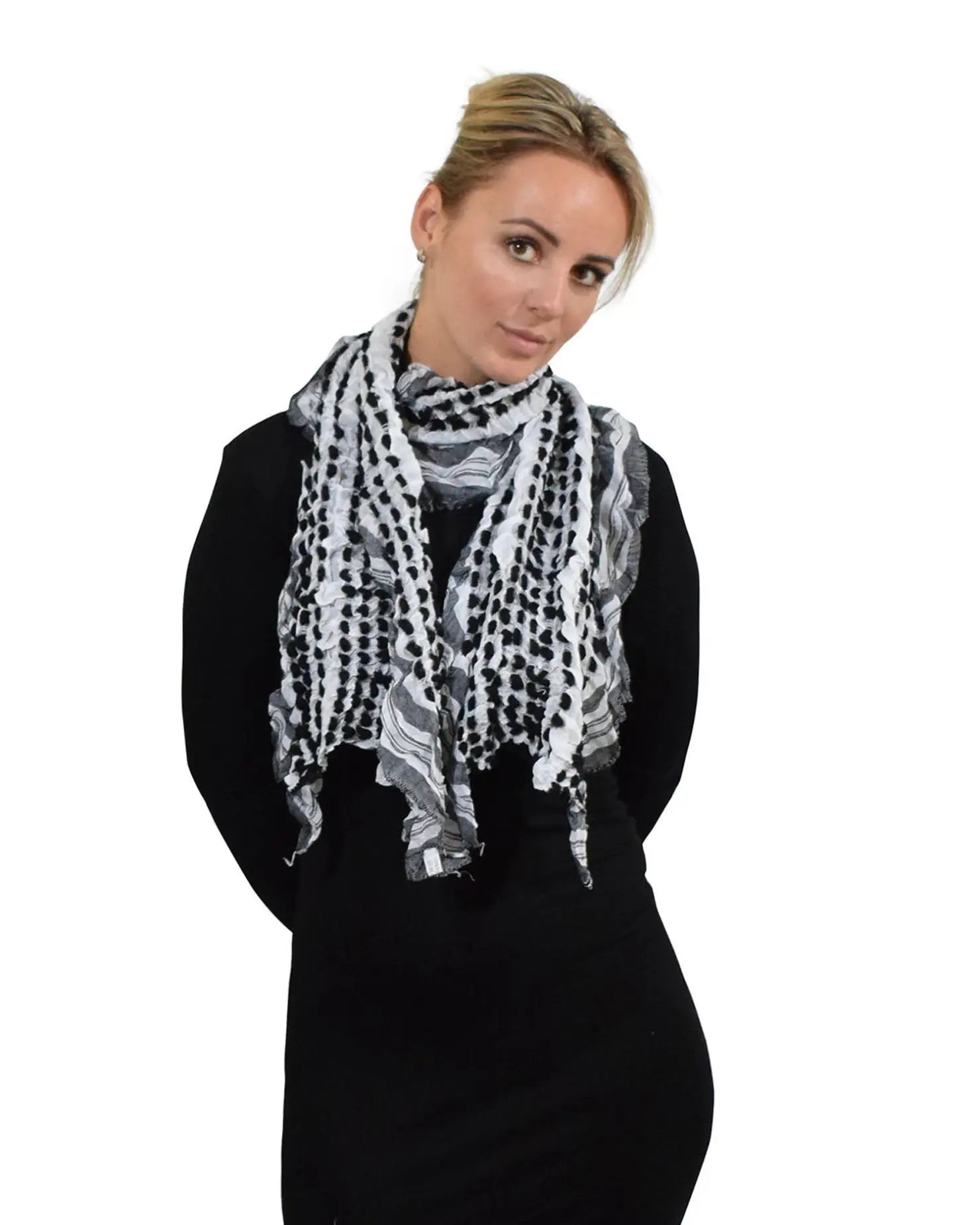 Soft knitted scarf with ruffled texture and striped print worn by a woman