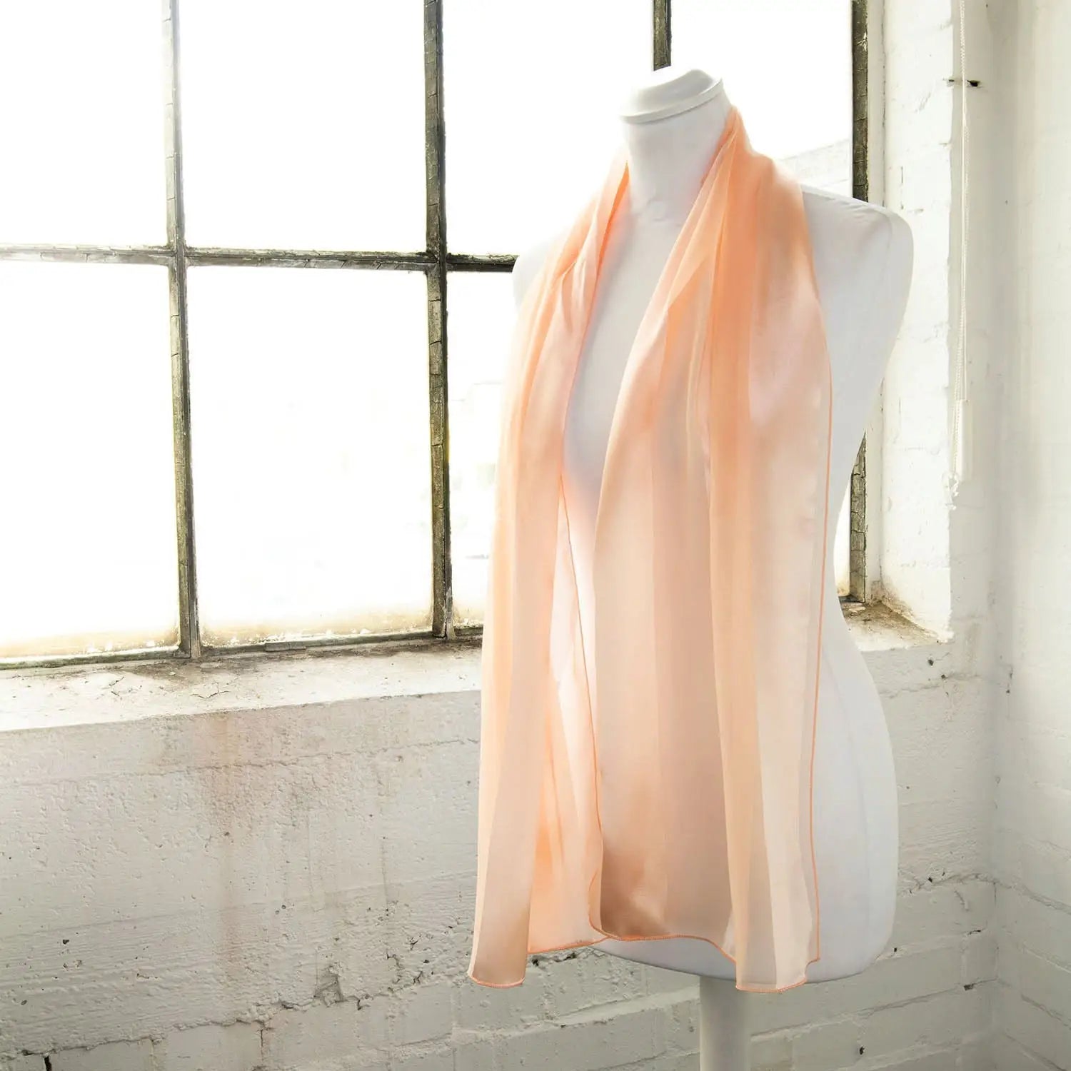 Pink satin stripe scarf on a mannequin - Solid Shimmering Satin Stripe Scarf.