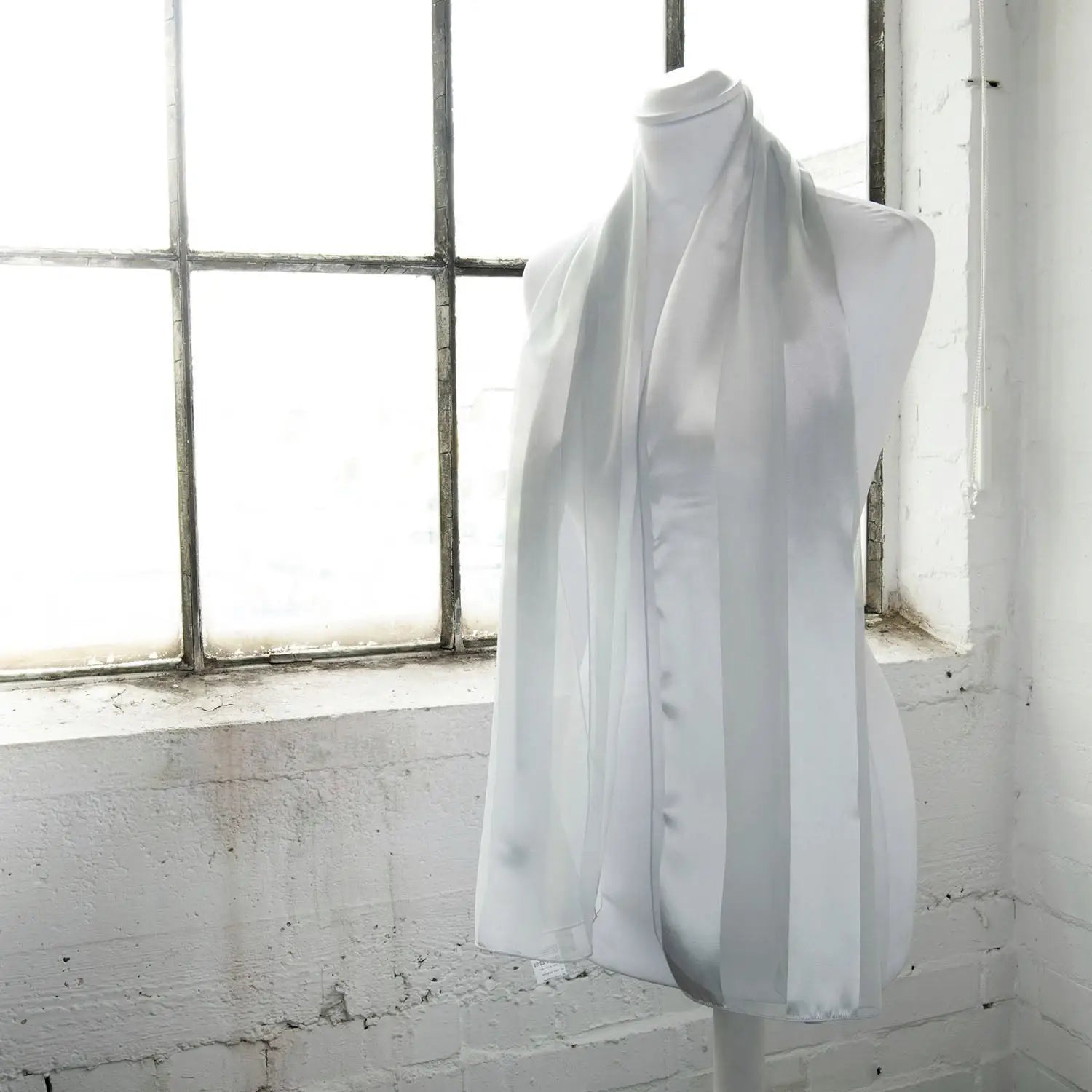 White satin stripe scarf hanging on window, Solid Shimmering Satin Stripe Scarf - Lightweight.