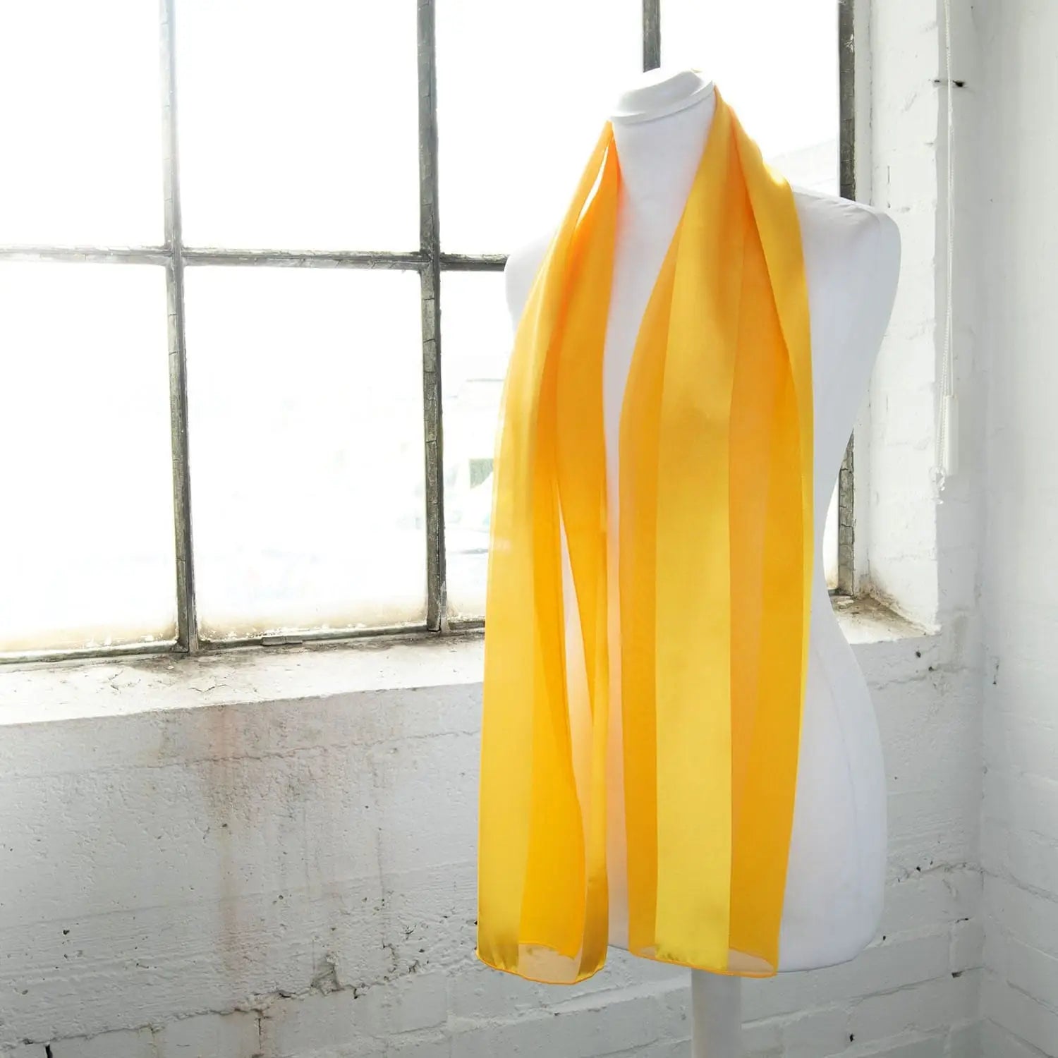 Yellow satin stripe scarf displayed on mannequin - Solid Shimmering Lightweight