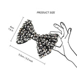 Sparkling black bow hair clip with crystals