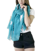Woman wearing retro star oversized scarf shawl