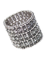 Sterling silver cuff bracelet with stack of silver beads on white background