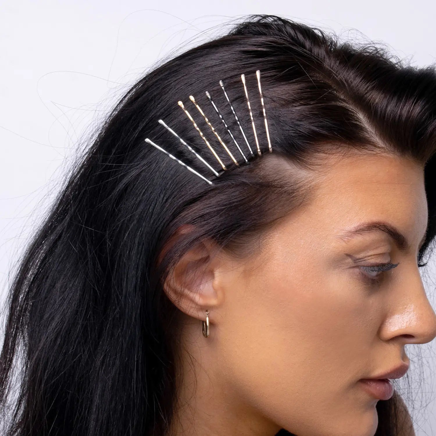 Sturdy metal wavy bobby pins grip on woman’s hair